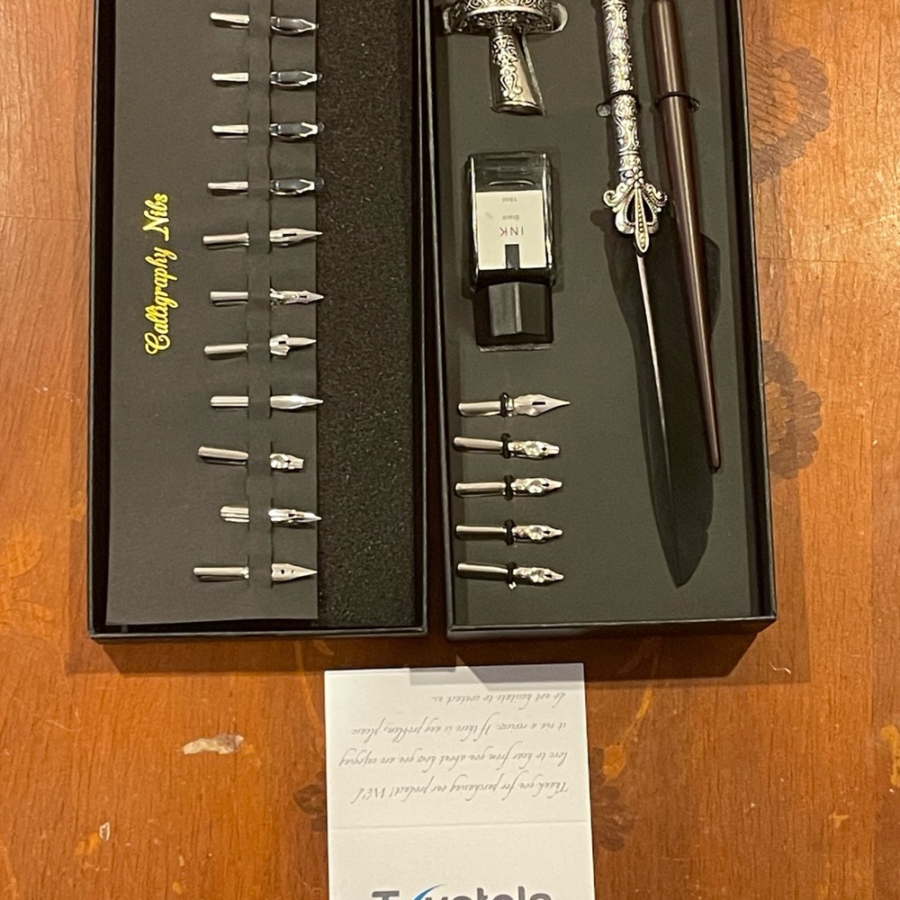 Elegant Calligraphy Set with Silver and Black Accents